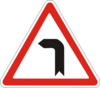 Дорожный знак 1.2 Опасный поворот в левую сторону